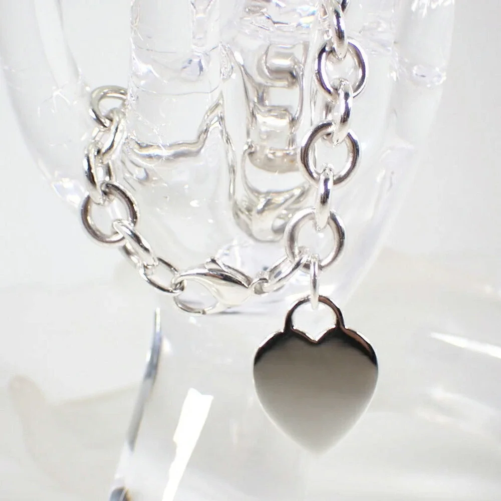 TIFFANY Silver Heart Charm Bracelet